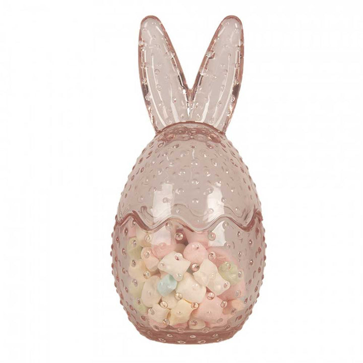 Eine mit Süßigkeiten gefüllte Clayre & Eef - Osterhase Glas-Bonbonniere.