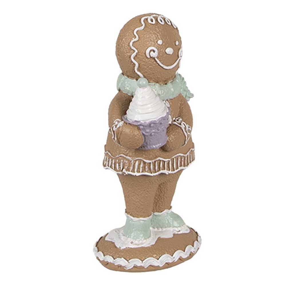 Die Clayre & Eef - Pfefferkuchenmann Weihnachtsdeko zeigt eine Lebkuchenfigur mit Zuckergussdetails, die einen Cupcake hält und einen Schal trägt.