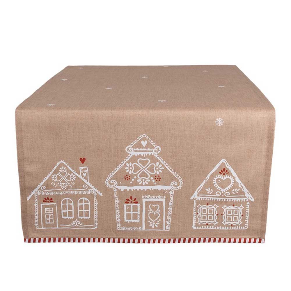 Eine beige Tischdecke von Clayre & Eef namens „Tischläufer Lebkuchenhäuser“, mit weiß-roten Dekormustern von drei Häusern auf der einen Seite.