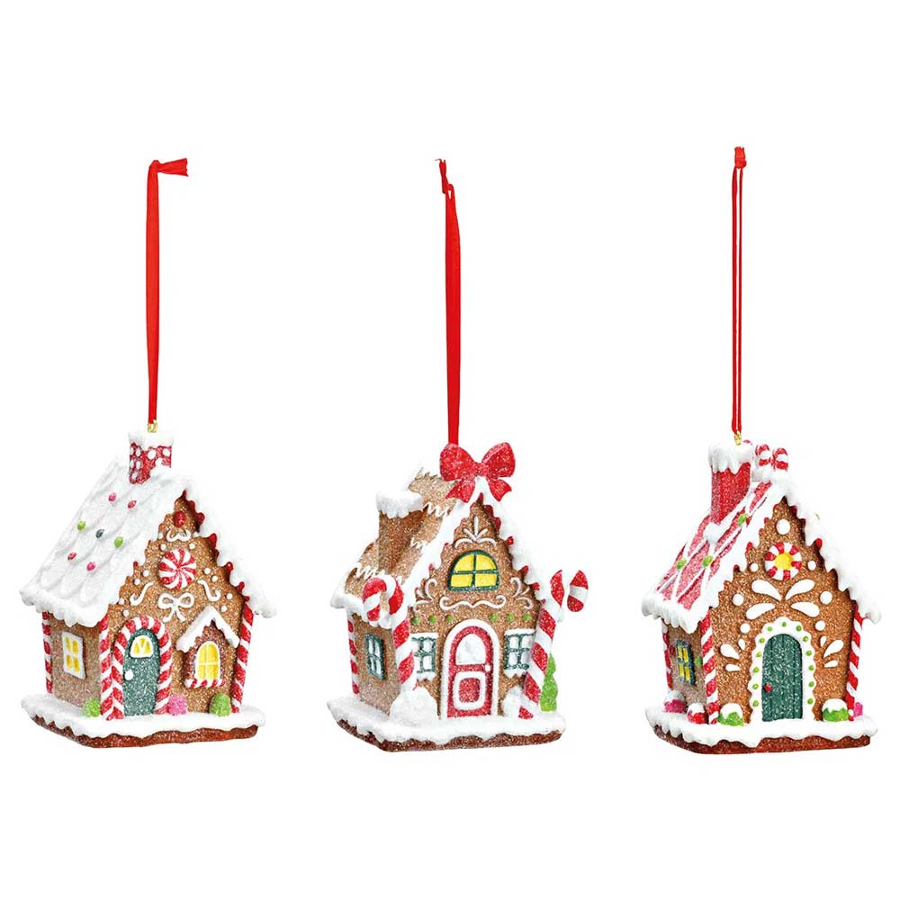 Drei G. Wurm - Anhänger Lebkuchenhaus-Ornamente mit roten hängenden Bändern, verziert mit Zuckerguss und lebendigen Details.