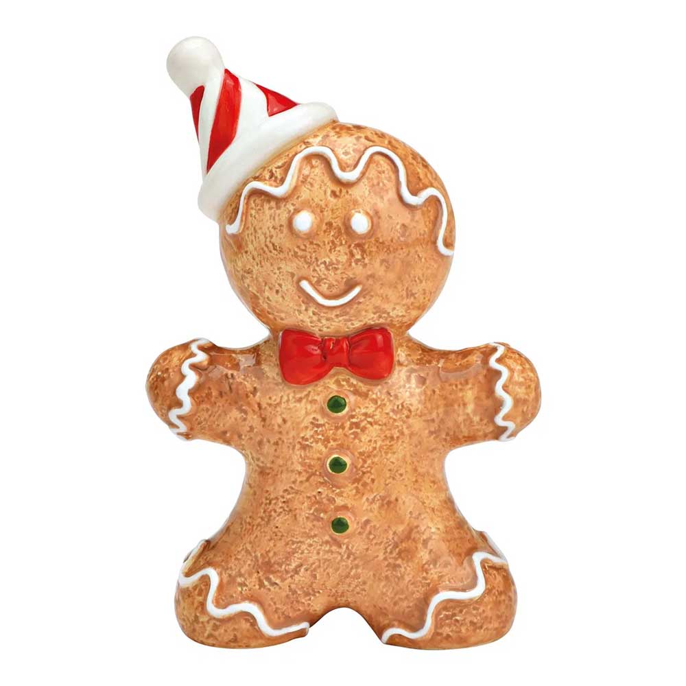 G. Wurm – Lebkuchenfigur mit Hütchen aus Keramik zeigt eine Lebkuchenfigur aus Keramik, die mit einer roten Fliege, grünen Knöpfen, einem rot-weißen Hut und weißen Zuckergussdetails geschmückt ist.