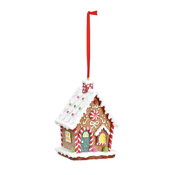 G. Wurm - Anhänger Lebkuchenhaus mit Zuckergussdetails, Süßigkeitendekorationen und einem roten Band zum Aufhängen.