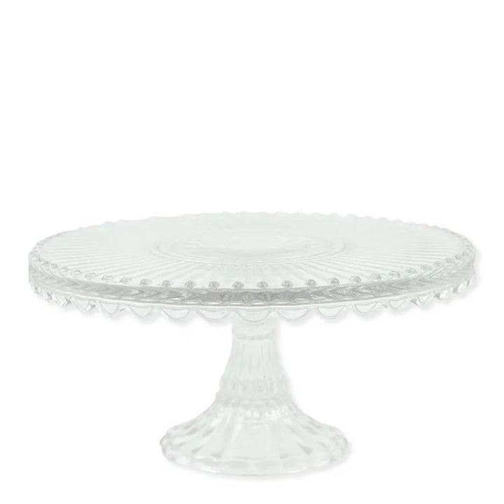 Die Alice Tortenplatte Glas von GreenGate besteht aus klarem Glas mit strukturierter Oberfläche und einem dekorativen Sockel.