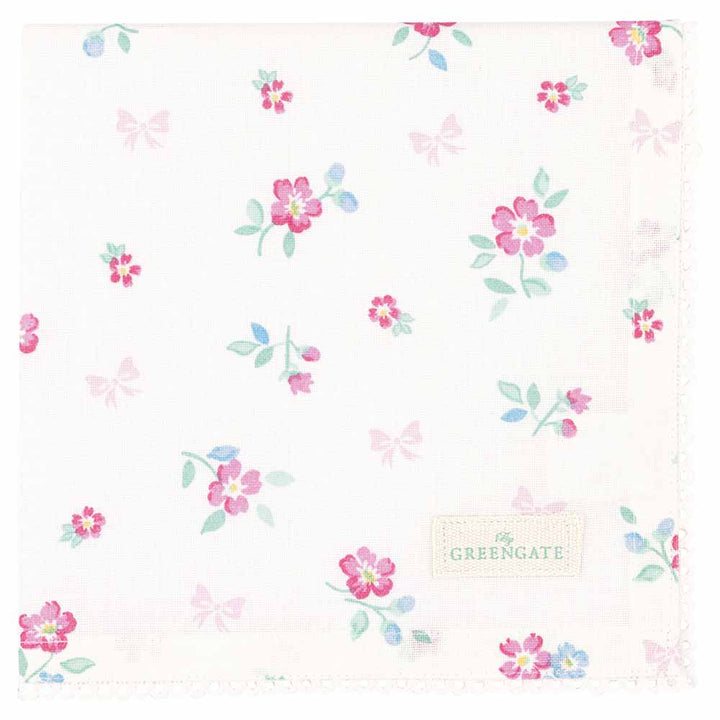 Weiße Stoffserviette mit rosa und blauem Blumenmuster, Spitzenrand, Aufschrift „GreenGate – Athea Stoffserviette White“.