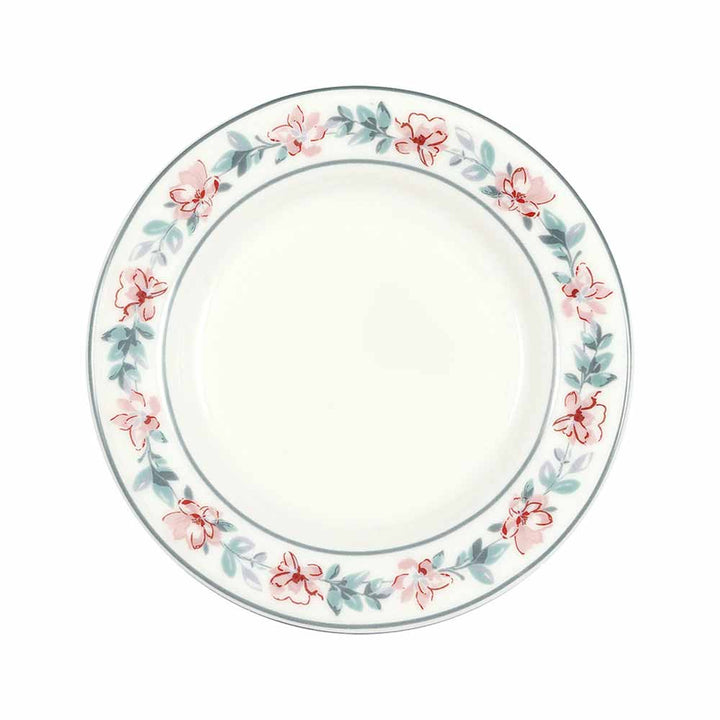 Ein runder weißer GreenGate - Jalia Keksteller in Weiß mit floralem Randdesign mit rosa und roten Blumen und grünen Blättern.