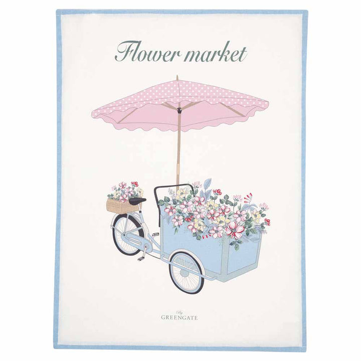 Illustration eines Fahrrads mit einem großen, mit Blumen gefüllten Korb, auf dem sich ein rosa Regenschirm befindet. Text: „GreenGate - Portia Flowers Geschirrtuch Piece Printed White“.