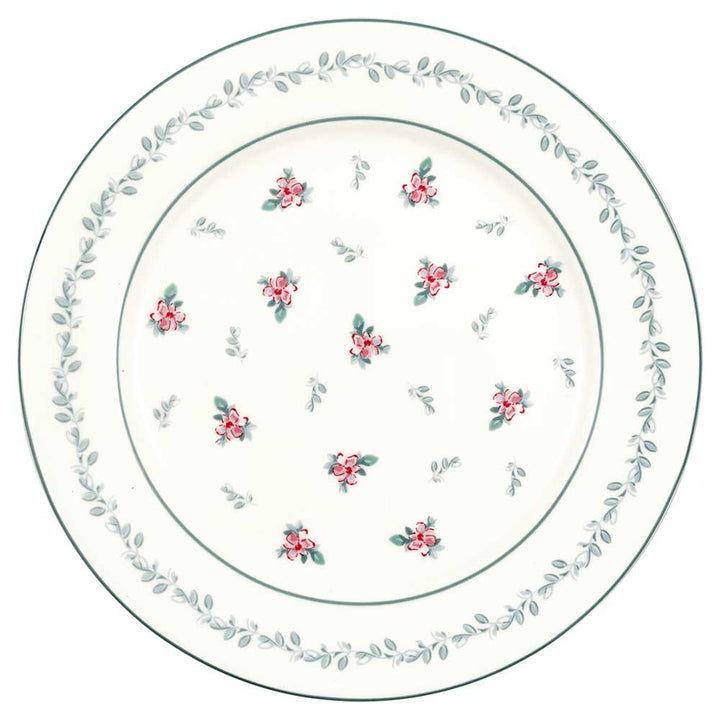 Ein GreenGate - Speiseteller Jalia in Weiß mit einem floralen Design aus kleinen rosa Blüten und grünen Blättern, umrandet von einem Muster aus grünen Blättern.