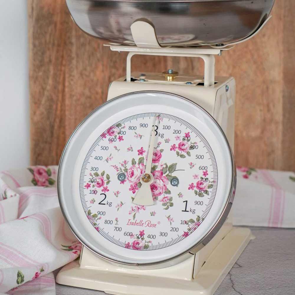 Eine Isabelle Rose - Küchenwaage Retro mit floralem Design auf dem Zifferblatt.