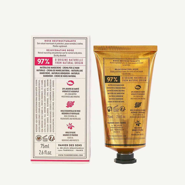 Eine Tube verjüngende Handcreme Panier des Sens – Handcreme Rose neben der Schachtel mit Produktdetails und Inhaltsstoffen.