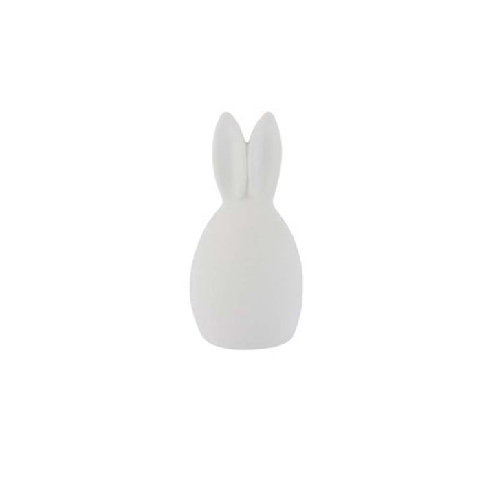 Weiße minimalistische Kaninchenskulptur von Storefactory namens „Hase Emma“, von hinten betrachtet.