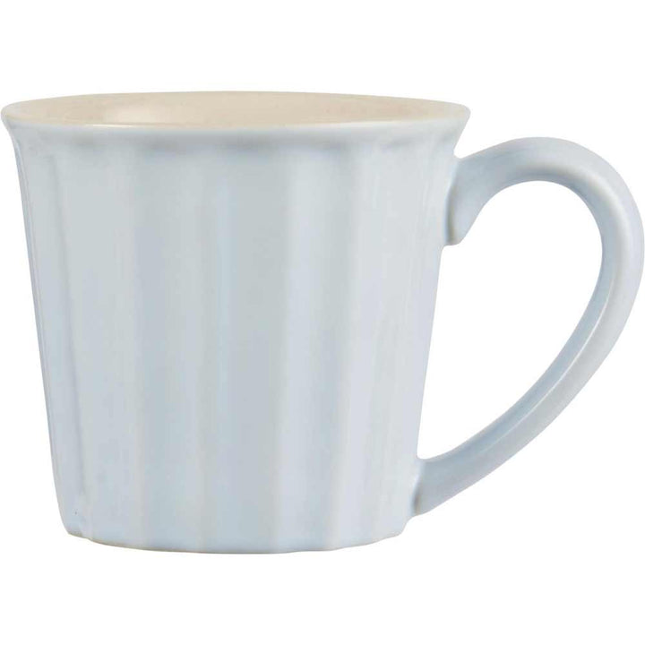 Ein Ib Laursen - Becher Mynte mit weißem Henkel auf weißem Hintergrund.