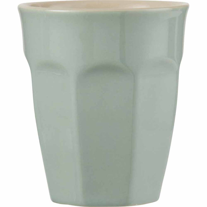 Ein hellgrüner Ib Laursen - Cafe Latte Becher Mynte Übertopf mit konischem Design und glatter Oberfläche.