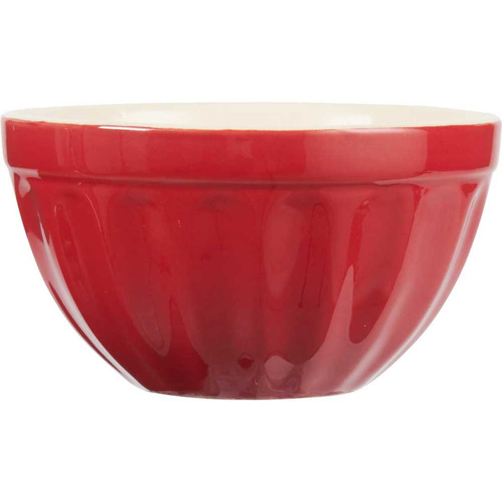 Eine glänzend rote Ib Laursen - Müslischale Mynte mit glattem, geschwungenem Design.