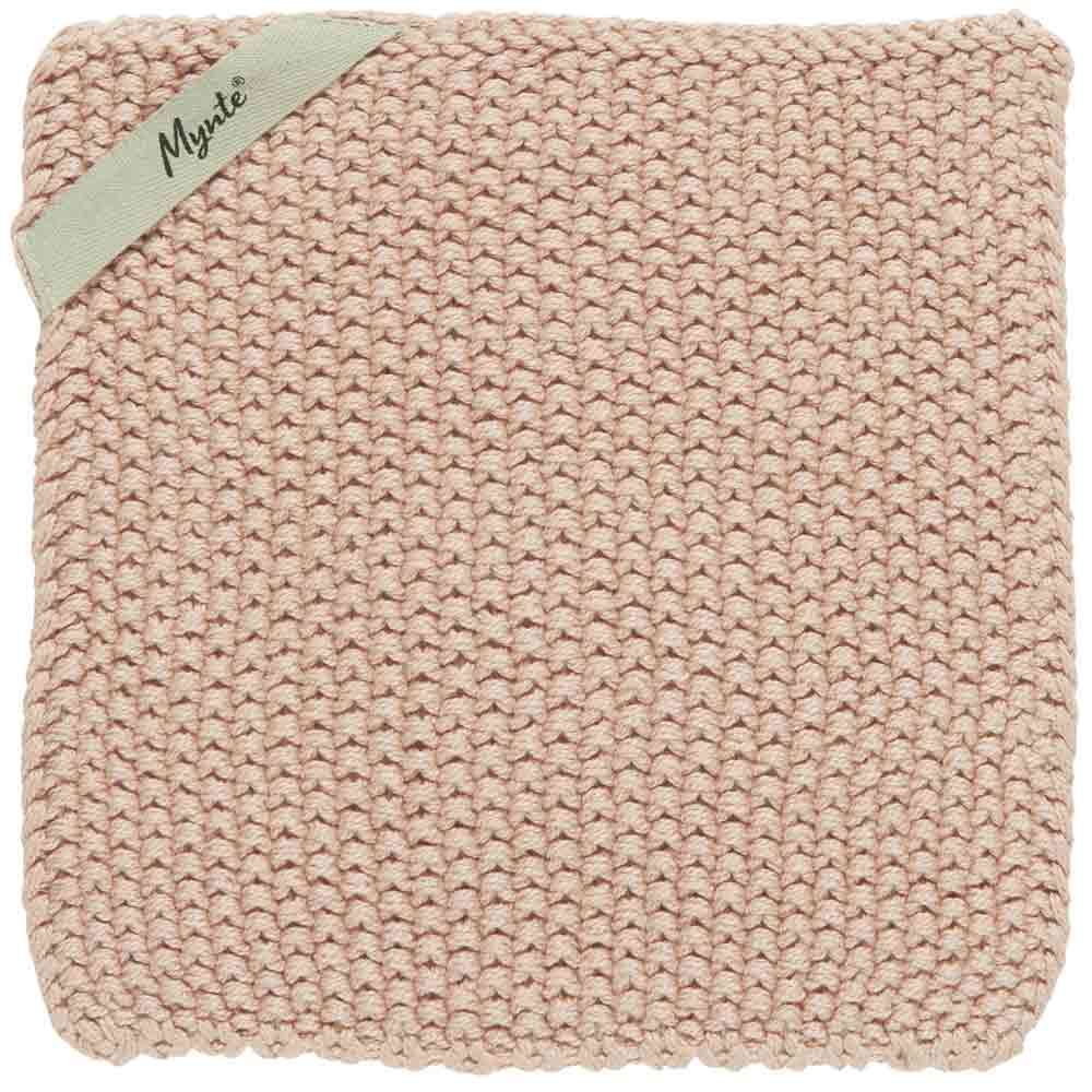 Quadratische, rosa Strickdecke mit einem mintgrünen Etikett mit der Aufschrift „Ib Laursen – Topflappen Mynte“ in der oberen linken Ecke.